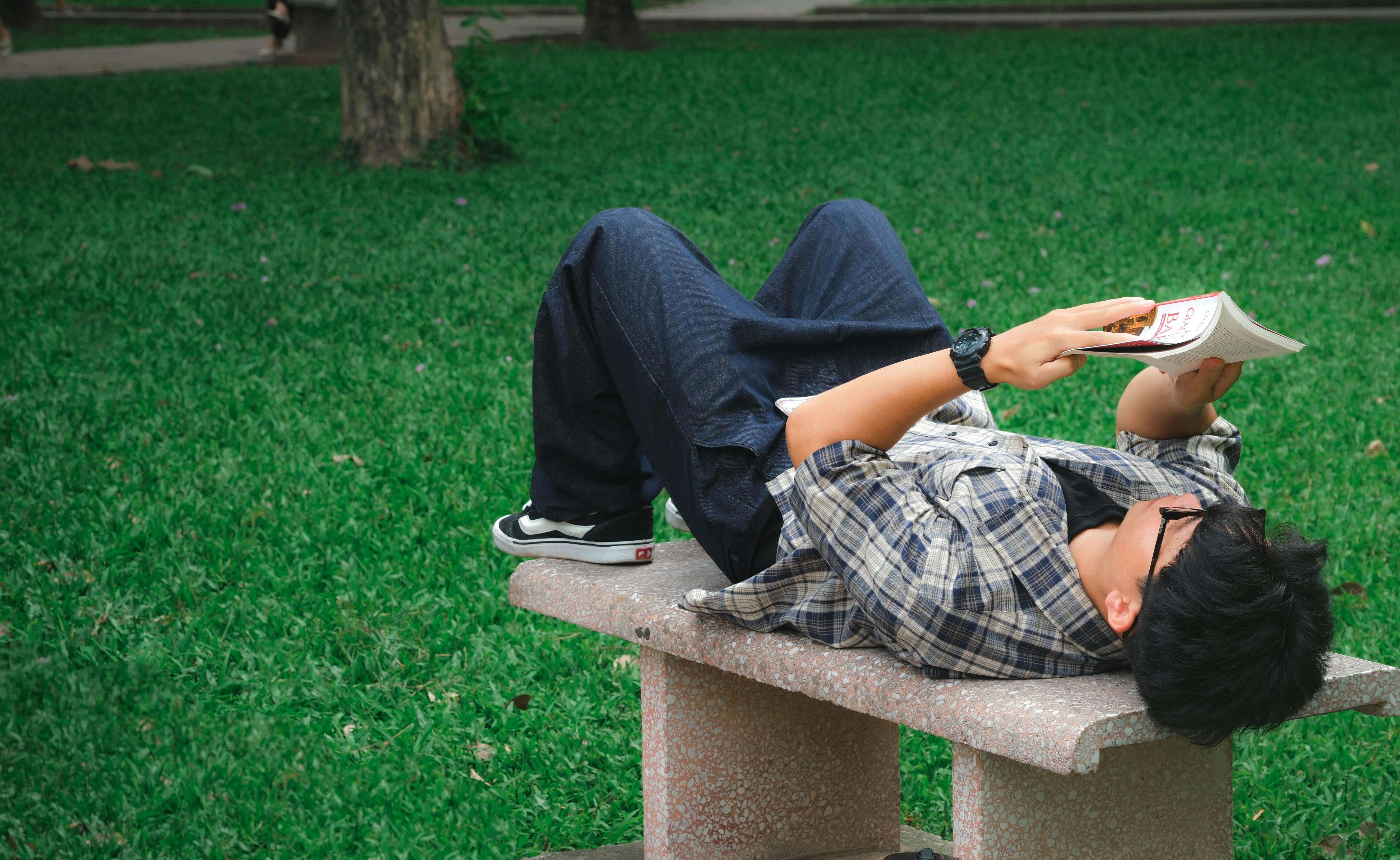 Laying outside on the bench