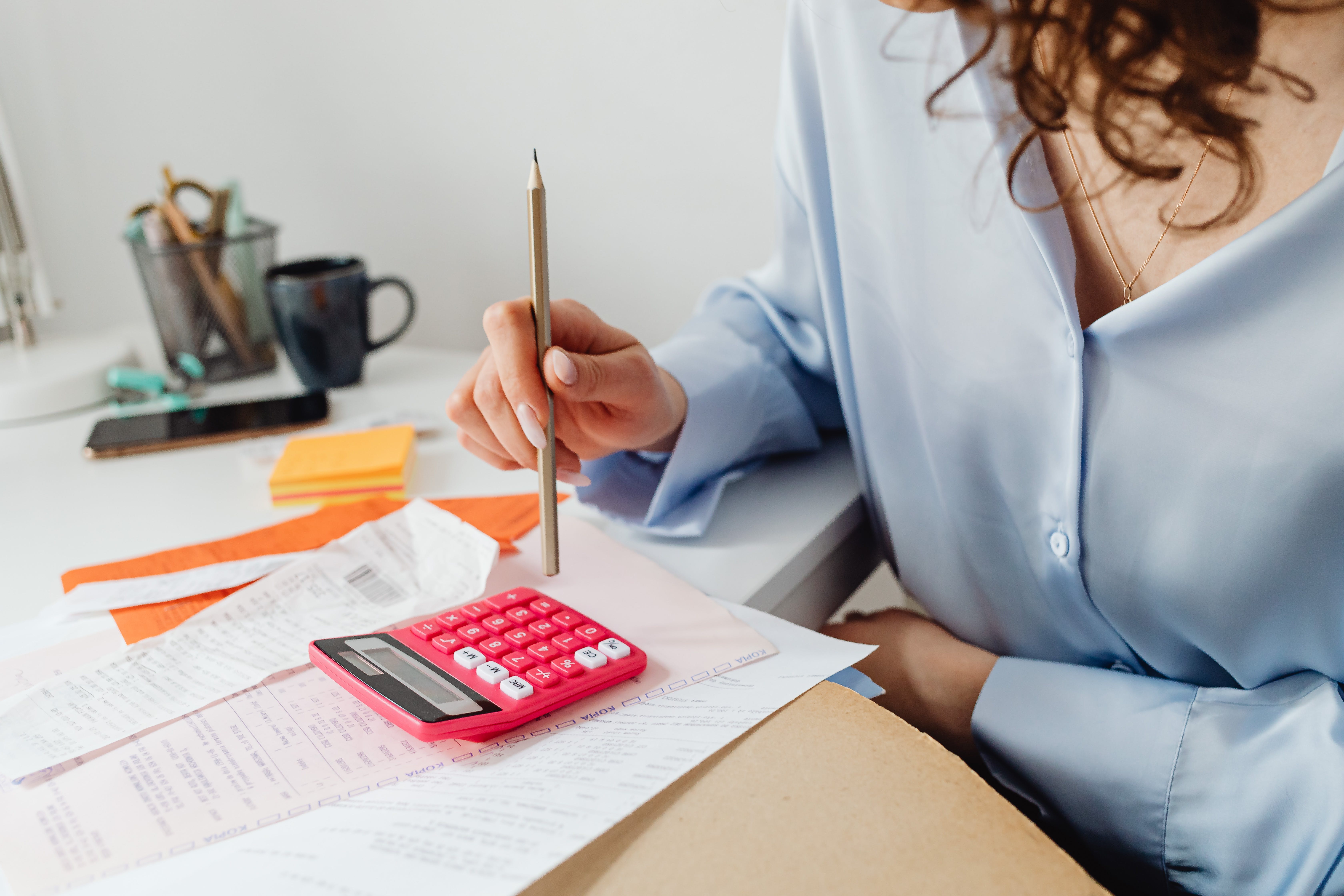 Woman Calculating bills