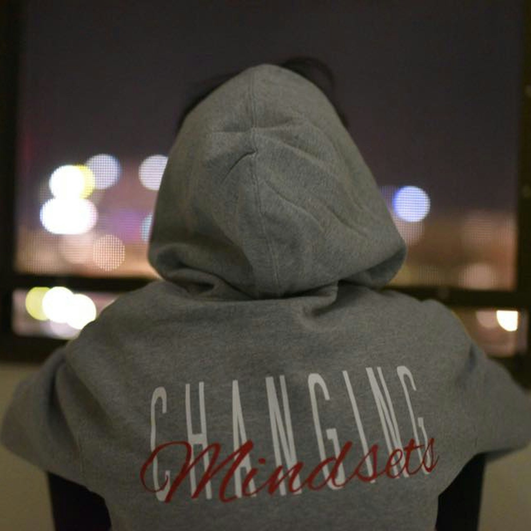 a person wearing a hoodie